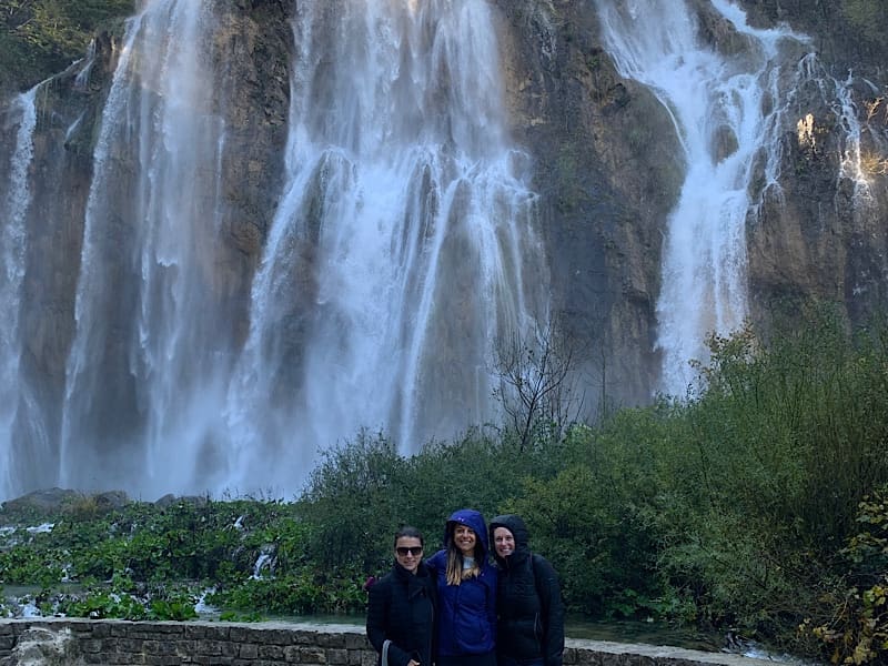 Girls under the Croatia waterfall