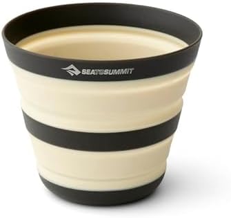 Cream and black Sea to Summit collapsible silicone camp cup, expanded